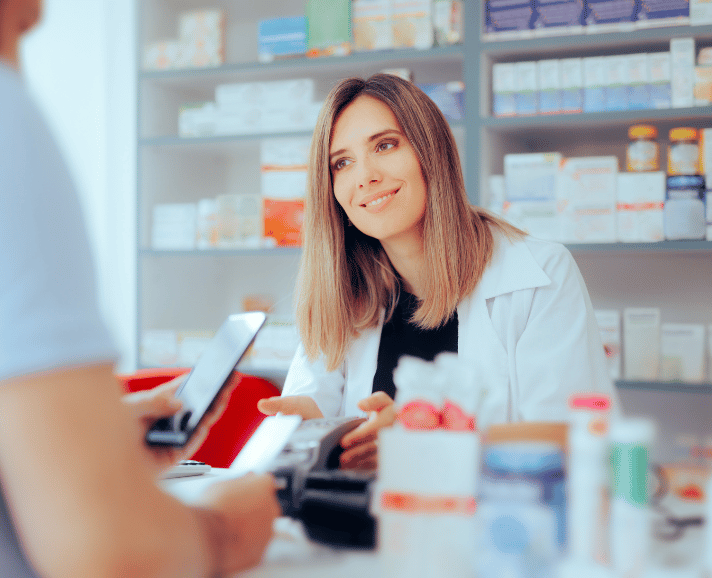 Unicorn Soft Labs a girl collecting money from customer in Pharmacy